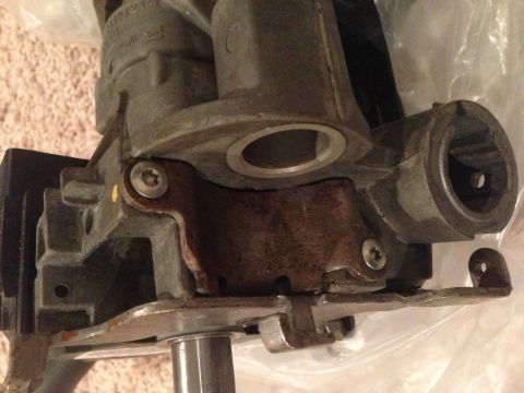 2009 Ford Crown Victoria - floor shift cover plate. front with two bolts holding it in place.