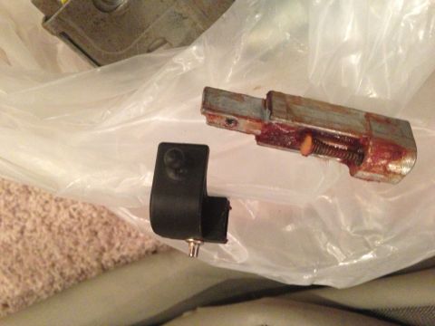 2009 Ford Crown Victoria - floor shift interlock, two parts.