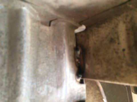1964 Ford Ranchero - A close-up view shows a metal bracket that has been welded, suggesting a repair or modification.