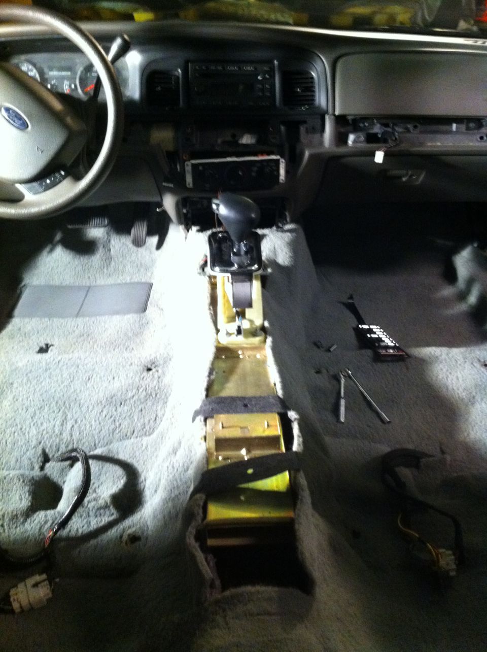 2007 Ford Crown Victoria interior showing removed center console and carpet