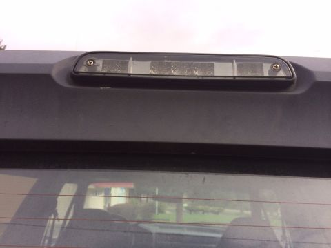 1992 Ford Bronco - Third brake light assembly on a vehicle.