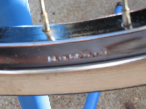 1994 Ford Bronco - Wheel rim with embossed text visible.
