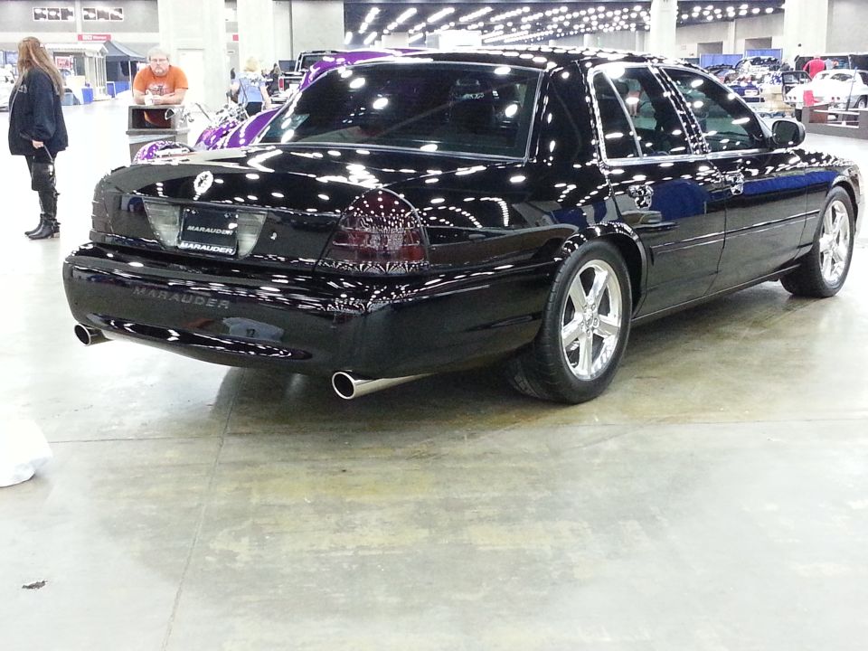 Black 2003 Mercury Marauder rear view with custom wheels