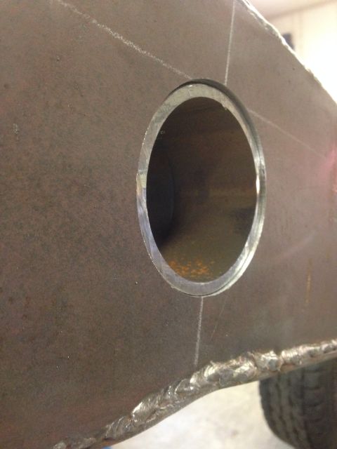 1993 Ford Bronco - Fabricated metal component with a precisely cut opening and rough weld details.