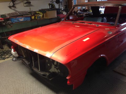 1964 Ford Fairlane - Front view of a 1964 Ford Fairlane undergoing restoration in a garage.