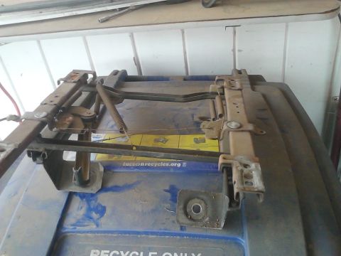 1990 Ford Bronco - passenger side seat bracket going to clean it up and repaint it