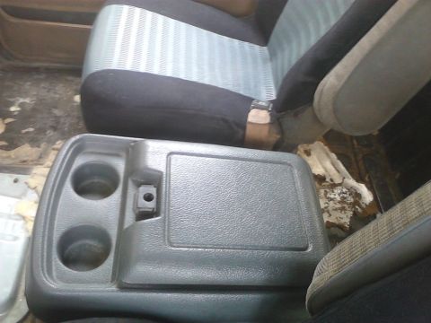 1990 Ford Bronco - found a blue console and soaked it in soapy hot water and scrubbed it clean than used some some cheap vinyl shine to make it look newer tha…