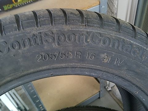 1993 Ford Probe - Close-up of a Continental ContiSportContact tire, size 205/55 R 16 91W.