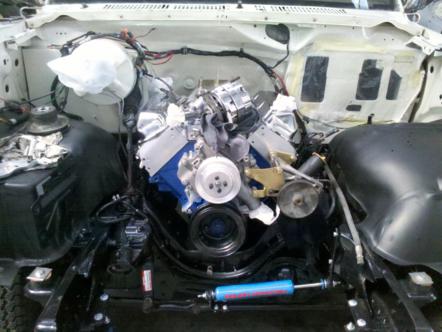 1982 Ford Bronco - Engine bay of a 1982 Ford Bronco, the installed engine and associated components.
