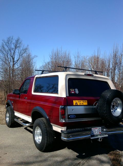 1992 Ford Bronco - This 1992 Ford Bronco is shown from the rear, a two-tone paint job and a spare tire carrier.