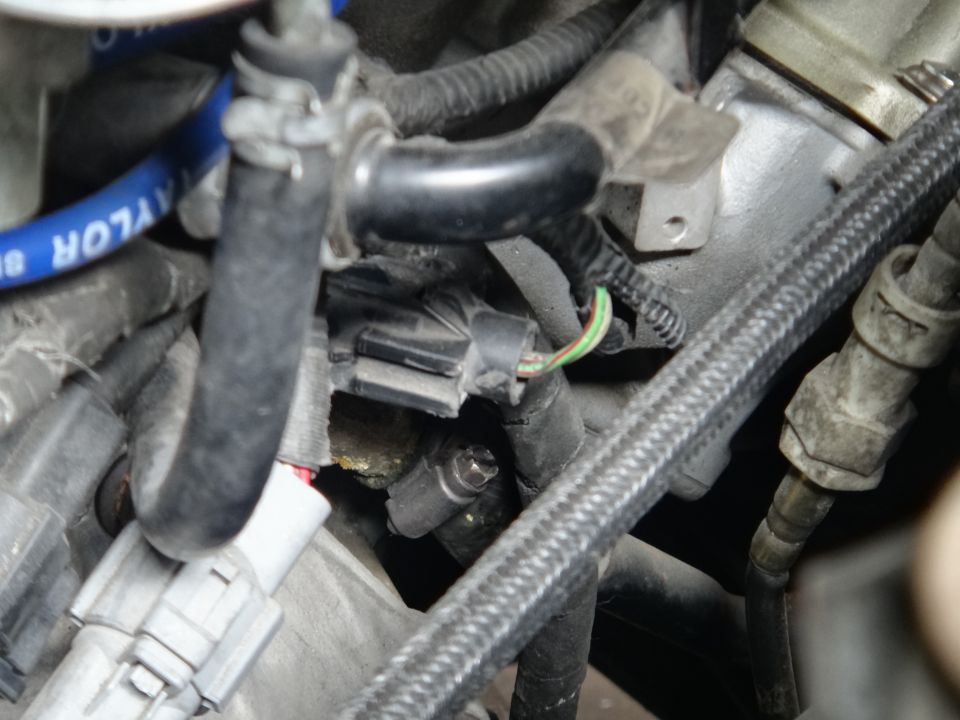 Engine sensor with green and brown wires