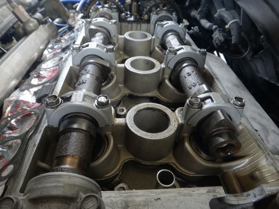 Close-up of engine camshafts and valve train components