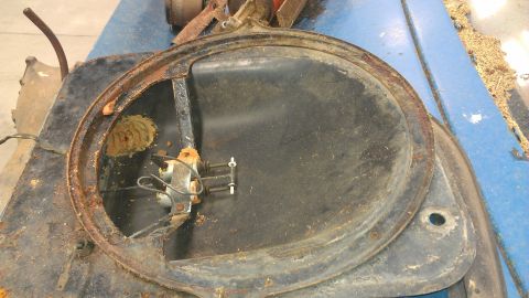 1970 Pontiac Trans Am - Close-up of a rusted fan shroud assembly, likely from an older vehicle, with visible motor and wiring.