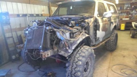 1995 Ford Bronco - This 1995 Ford Bronco is undergoing repairs or modifications, with its front end disassembled.