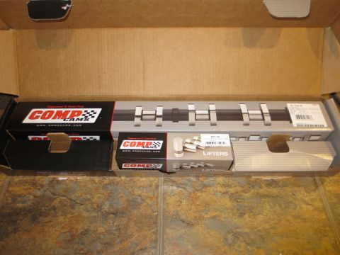1996 Ford Bronco - New Comp Cams camshaft and lifters are shown inside their packaging within a cardboard box.