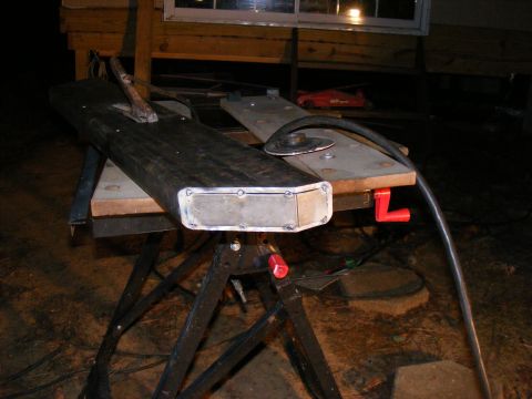 Custom bumper with metal insert on workbench