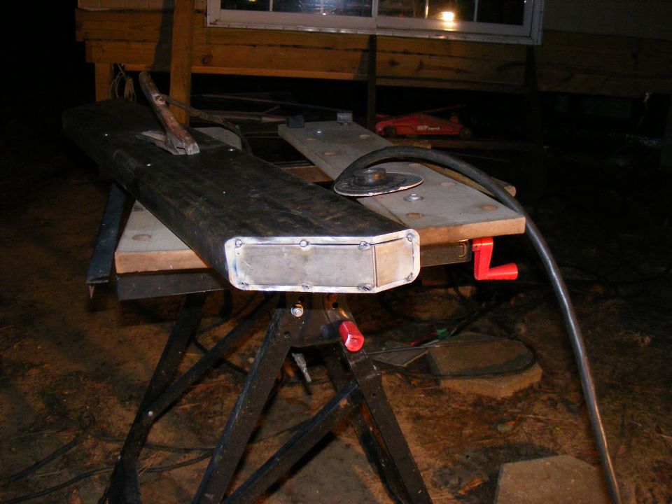 Custom bumper with metal insert on workbench