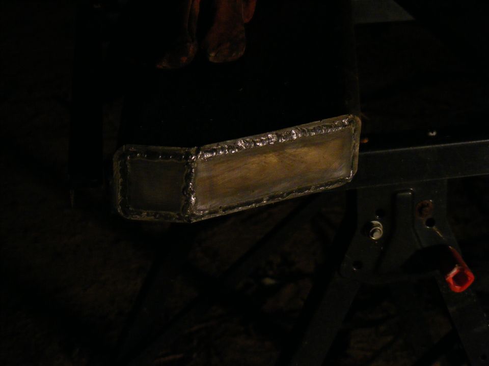 Welded metal part with a textured surface, possibly a custom bumper or trim piece