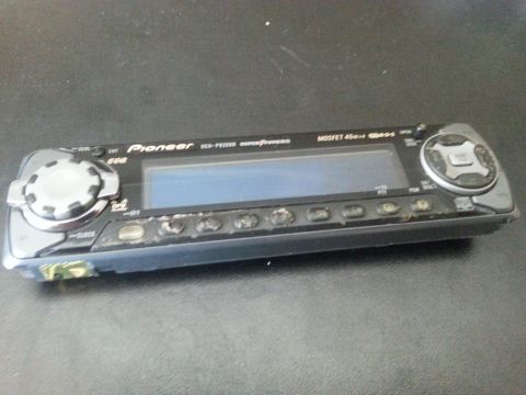 1995 Ford Bronco - A Pioneer car stereo unit is shown against a dark background.