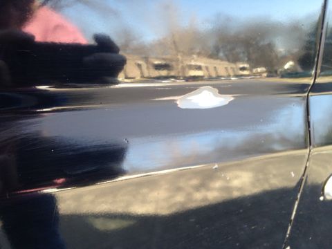 1990 Ford Bronco - The vehicle's body shows signs of rust and damage, requiring repair.