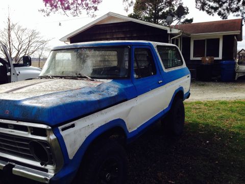 1979 Ford Bronco - This blue and white Ford Bronco appears to be from the late 1970s, possibly a 1978 model.