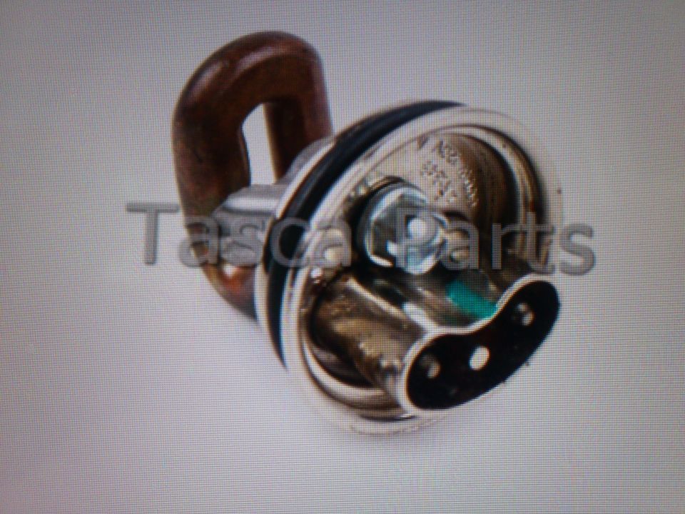 Engine block heater with a wooden handle and metal prongs