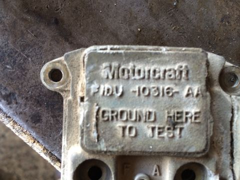 1998 Ford Crown Victoria - This Motorcraft part has visible text indicating its part number and testing instructions.