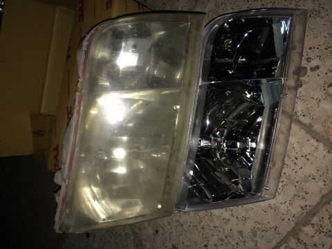1998 Ford Crown Victoria - Old versus new headlight assemblies shown side-by-side for comparison.
