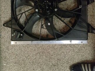 1995 Ford Bronco - A radiator fan assembly is shown, the SuperMotors logo at the bottom.