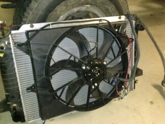 1995 Ford Bronco - A radiator and fan assembly, likely for a vehicle's cooling system, is shown.