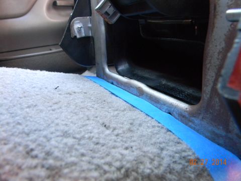 1995 Ford Bronco - Bolted up the front mounting bracket, located console and marked location with tape. Removed bracket, located at tape and screwed down the…