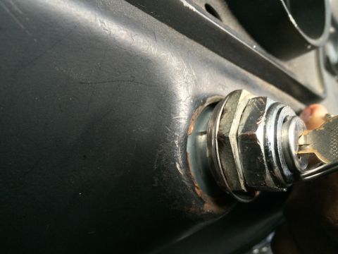 1964 Ford Ranchero - Ignition lock cylinder with key inserted, showing signs of wear and rust.