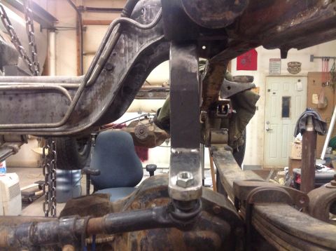 1993 Ford Bronco - Close-up view of vehicle undercarriage components, including suspension and frame elements.