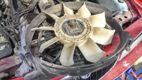 2000 Mercury Grand Marquis - Close-up of an engine cooling fan assembly, likely from a vehicle's engine bay.