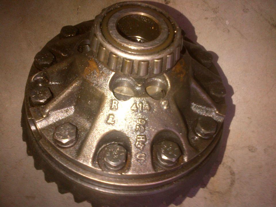 Differential carrier with bearing and visible gear teeth. Marked R 41A 2