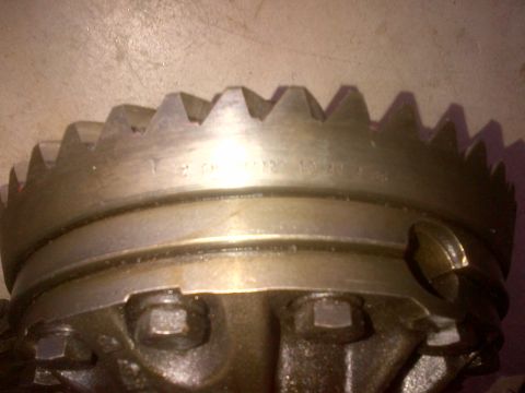 1985 Jeep CJ7 - Differential ring gear showing stamped part numbers and teeth detail.