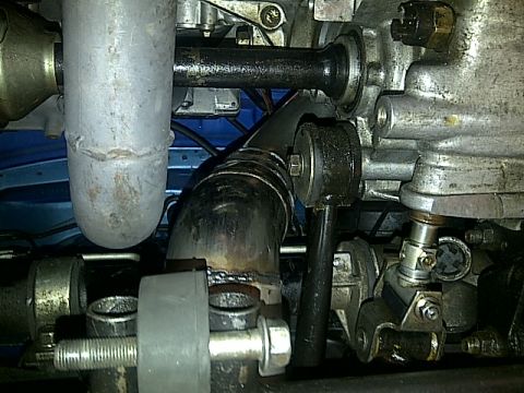 1995 Ford Probe - Close-up view of engine and exhaust components, with "SUPERMOTORS.NET" visible in the lower right corner.