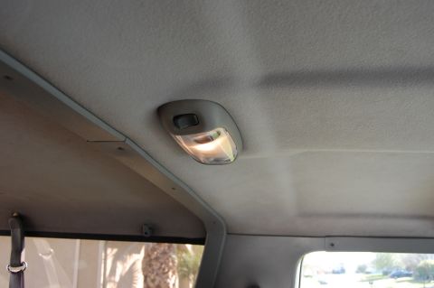 1994 Ford Bronco - Interior view of a 1994 Ford Bronco, focusing on the dome light and headliner.