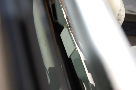 1994 Ford Bronco - Close-up view of an interior trim panel, showing its construction and attachment points.