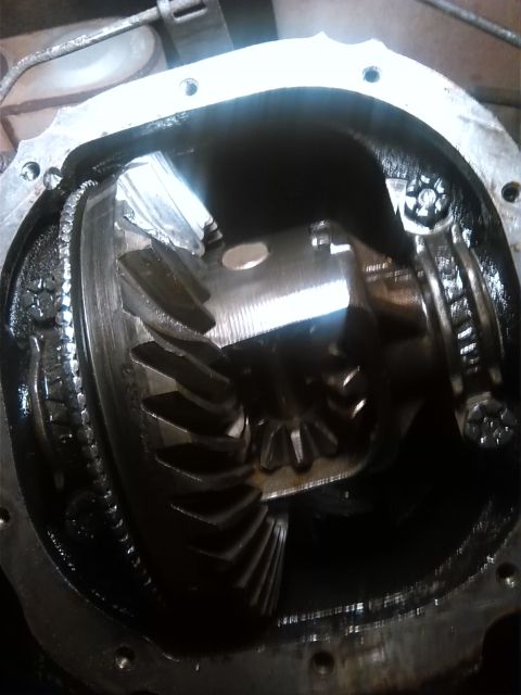 1992 Ford Bronco - Close-up of damaged differential gears within a vehicle's drivetrain component.
