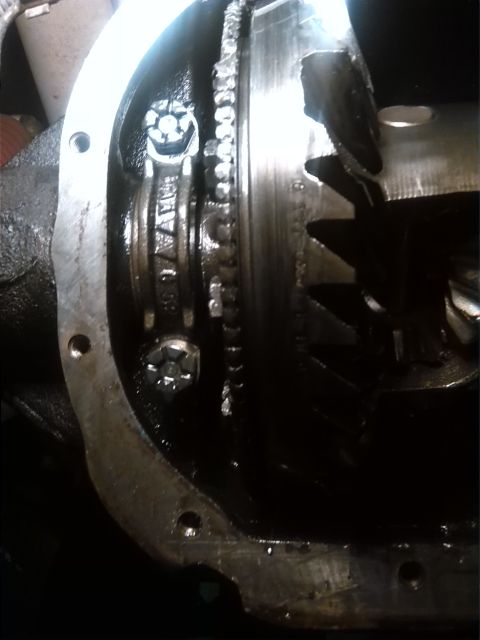 1992 Ford Bronco - Close-up view of internal differential gears and housing, with visible text 'SUPERMOTORS'.