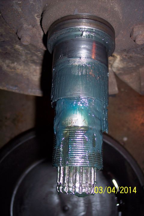 1973 Ford F-250 - Close-up of a greased splined shaft, showing the teeth of the component.