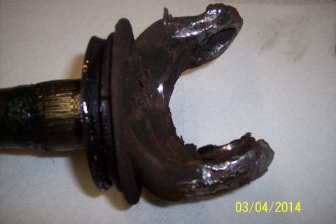 1973 Ford F-250 - This U-joint shows significant wear and damage, indicating a need for replacement.