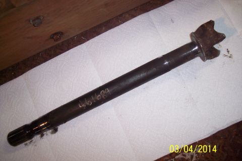 1973 Ford F-250 - A metal shaft with visible splines and a star-shaped end is shown on a white paper towel.