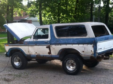 1979 Ford Bronco - This 1979 Ford Bronco is shown from a 3q-front angle with its hood up, revealing its engine bay.