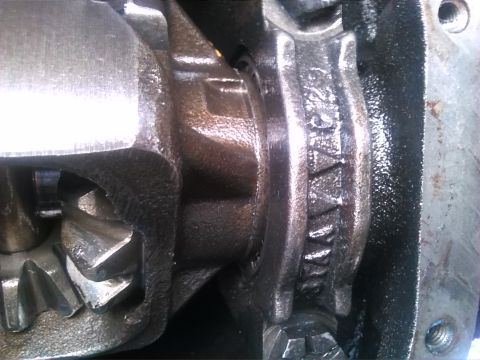 1992 Ford Bronco - Differential gears and housing with visible stamped numbers.