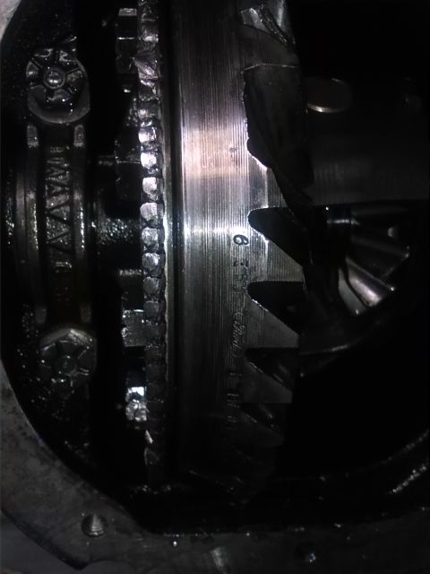 1992 Ford Bronco - Detail of internal differential gears, showing part numbers etched into the metal surface.
