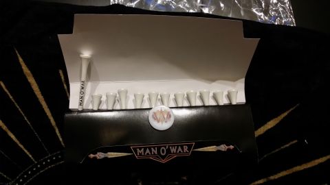 2007 Subaru Impreza - A box of Man O' War golf tees is displayed, with one tee showing the brand name.
