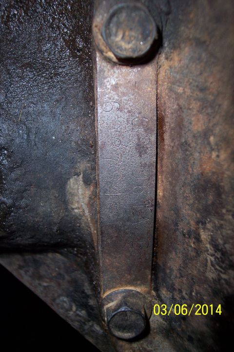 1973 Ford F-250 - An axle identification plate shows stamped numbers, likely a part number or serial number.