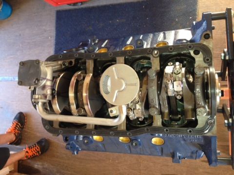 1996 Ford Bronco - Close-up view of an engine block's internal components, including the crankshaft and oil pump assembly.